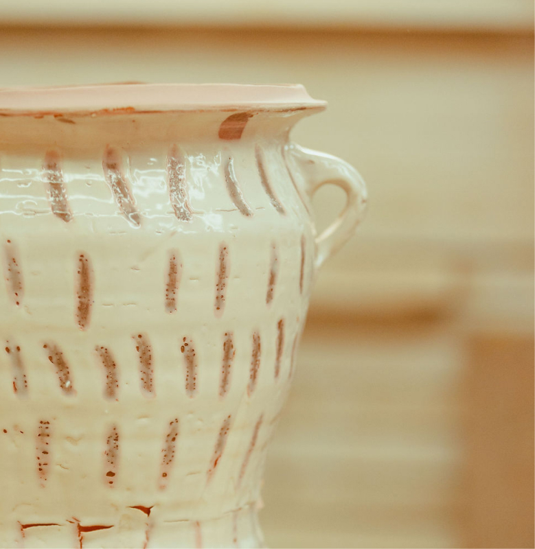 A detailed texture of glazing applied to a ceramic object, part of Remy Pajaczkowski-Russell's exhibition Moments of the Bay