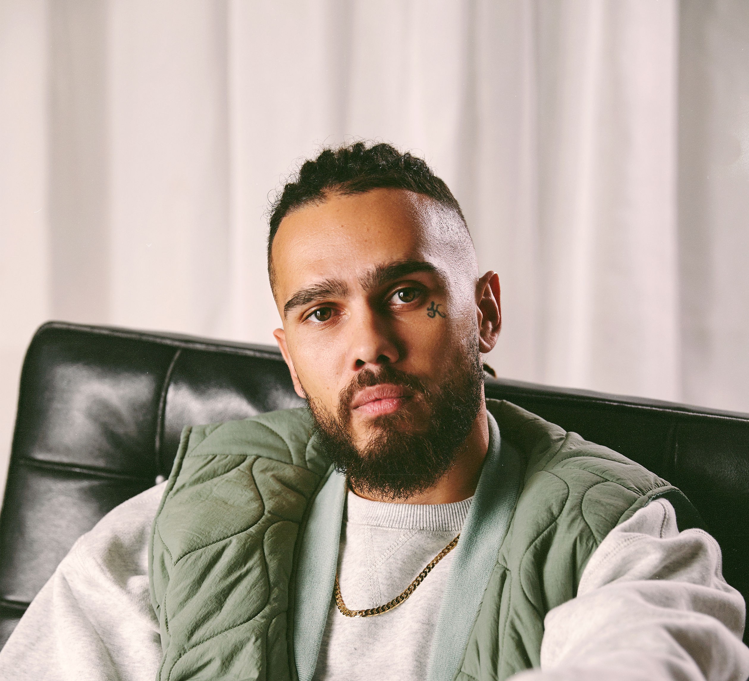 Rapper Kobie Dee looking straight to camera